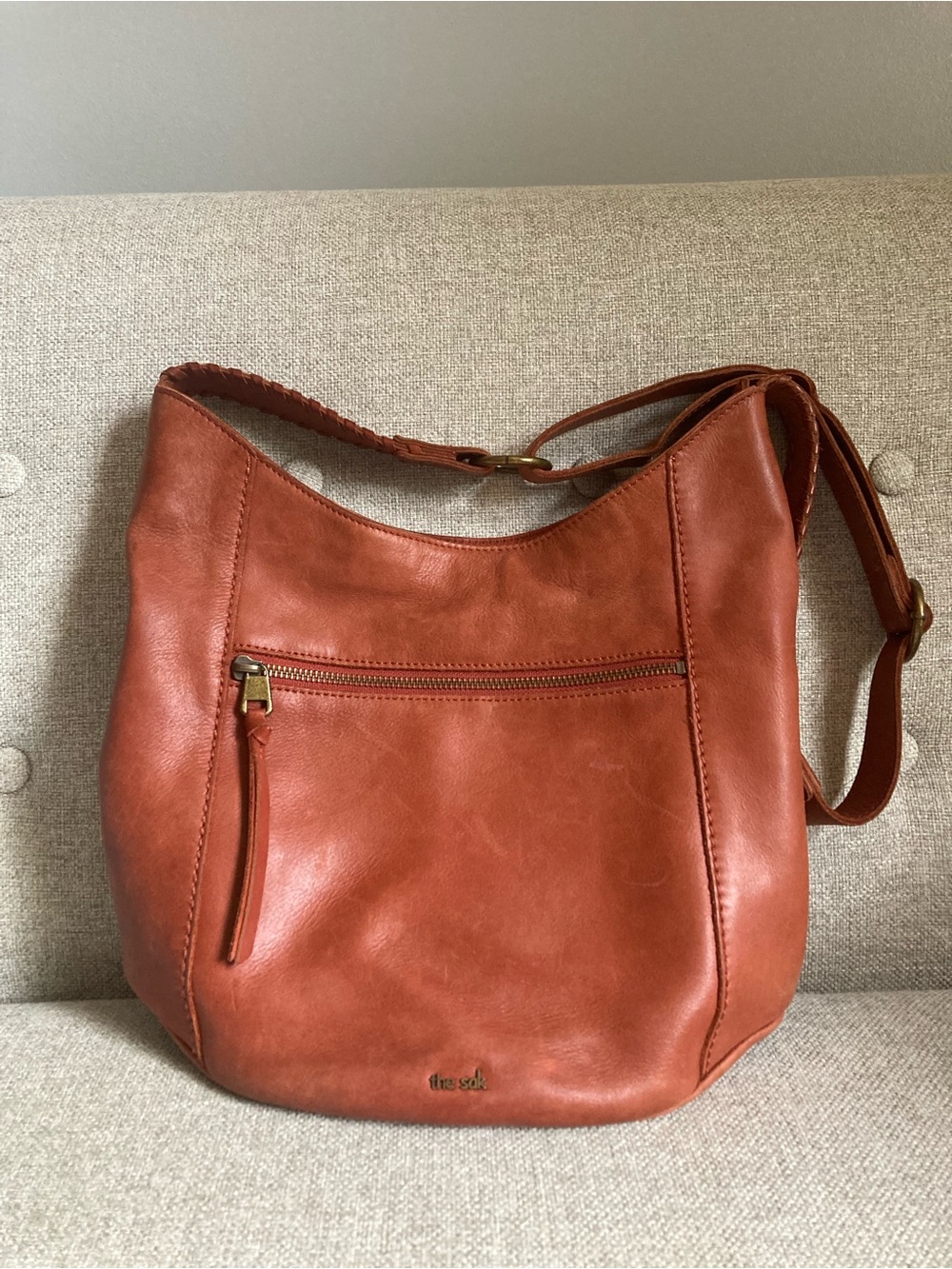 Brown leather The Sak purse